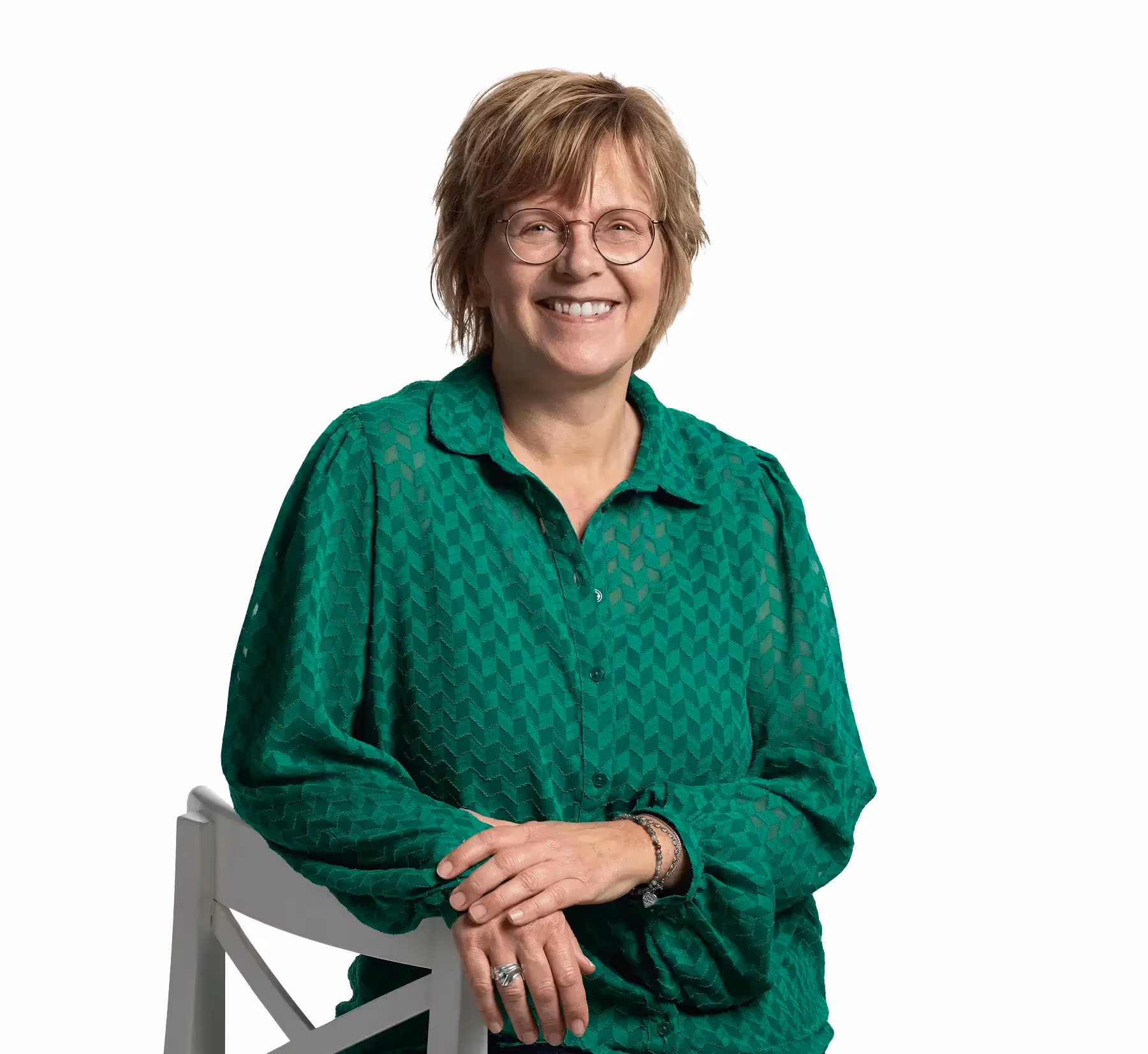 Tonja Berkelder, ACT-coach, zittend op een stoel
